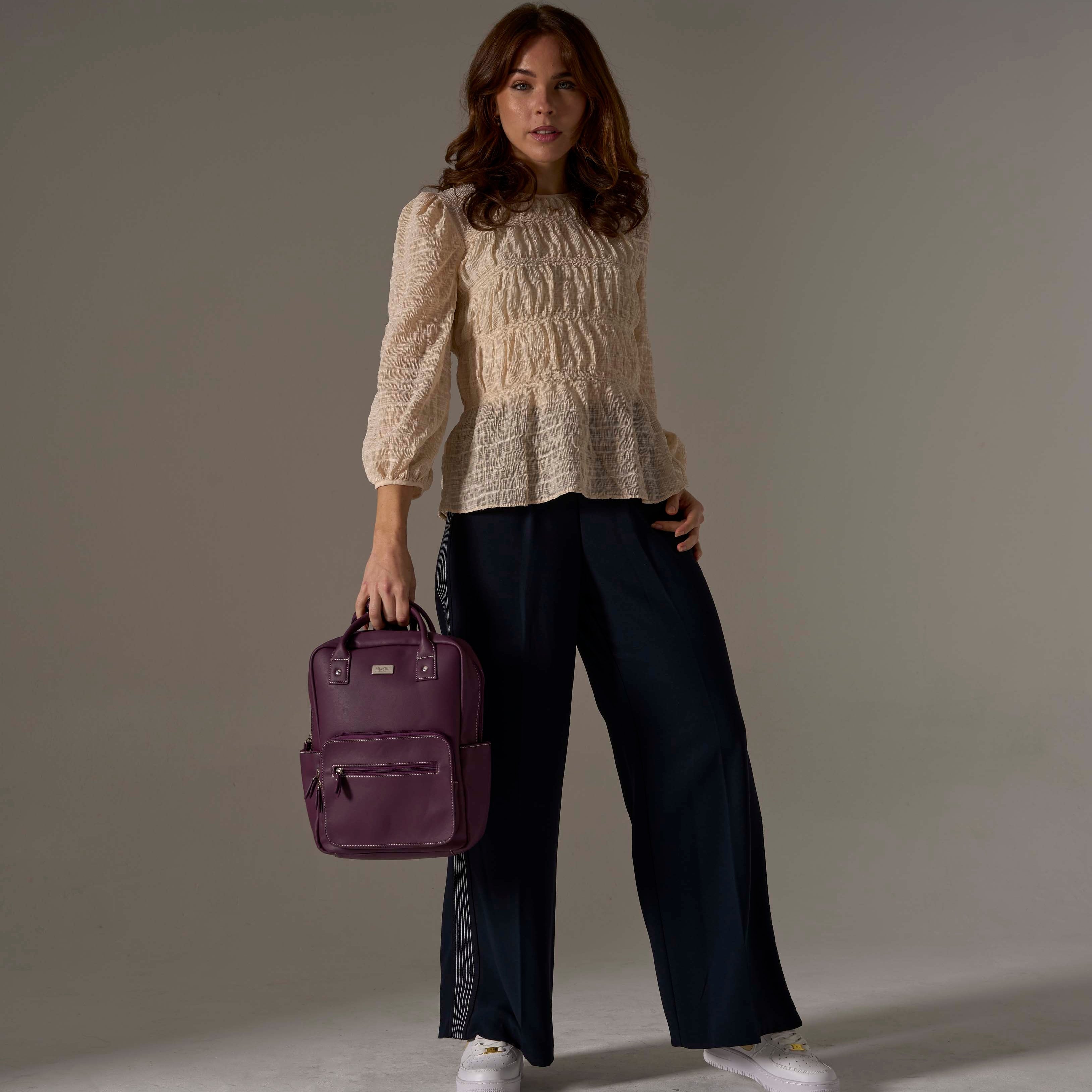 Included with your Darcy Backpack