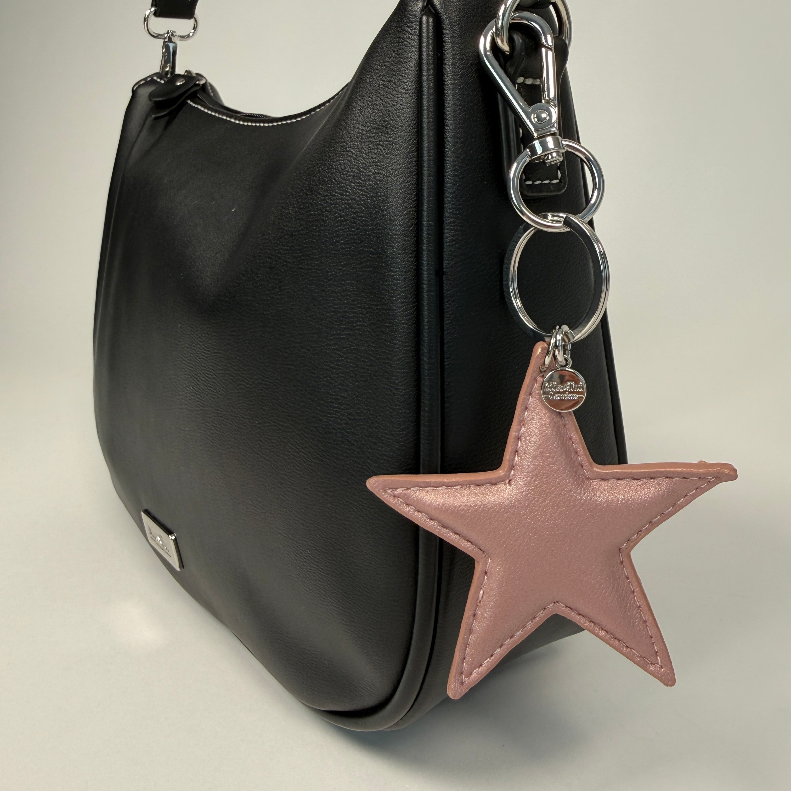 Star Keyring attached to a stylish Mia Tui bag, featuring a pink faux leather star charm.