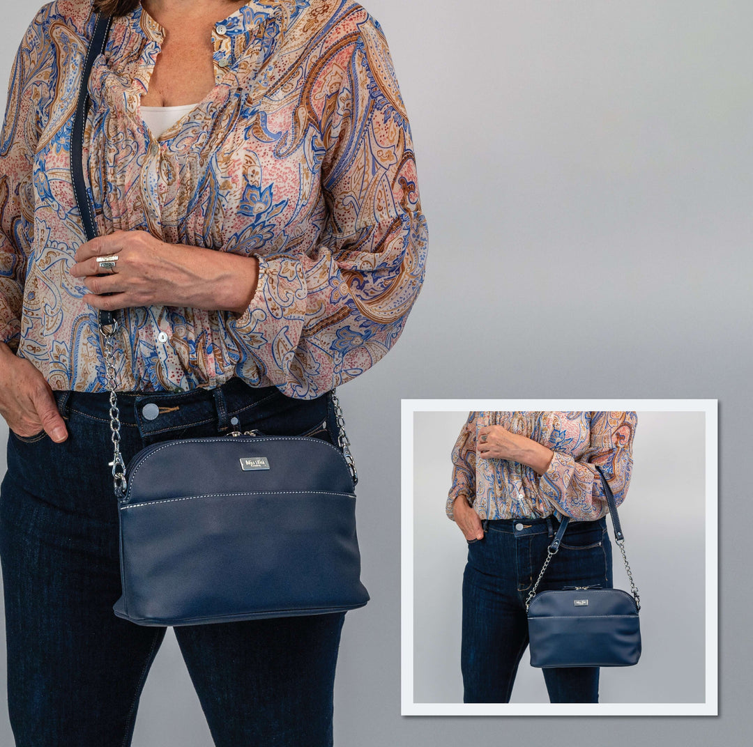 Rebecca - Outlet versatile crossbody bag displayed with chic chain detailing and stylish appearance.