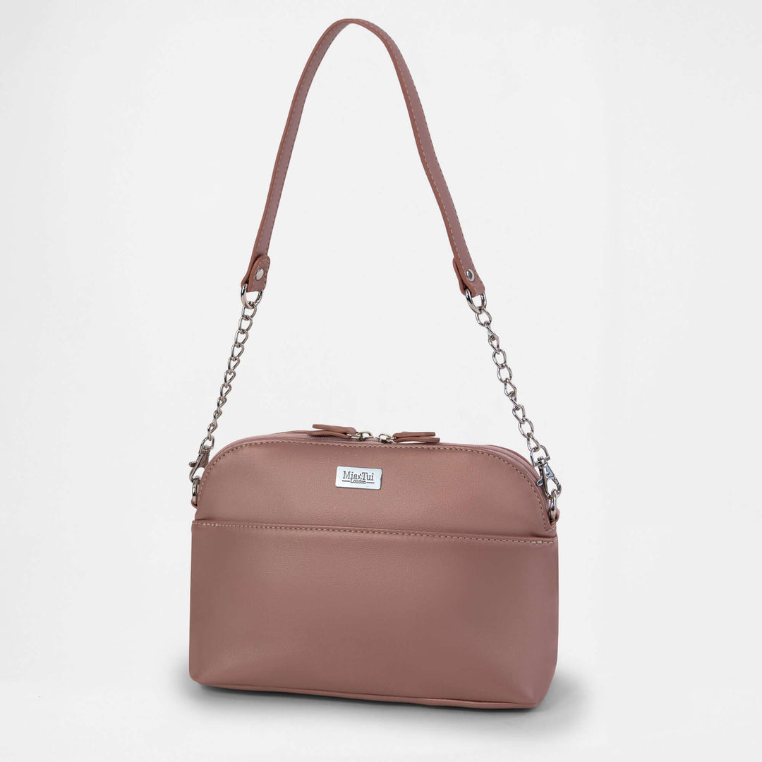 Rebecca - Outlet: pink crossbody bag with chain detailing and adjustable strap, perfect for day-to-night use.